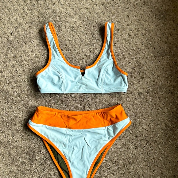 TNB Other - Never worn not sure the brand TNB charm on the inside
